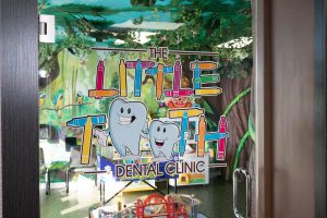 the logo of the little tooth dental office for kids